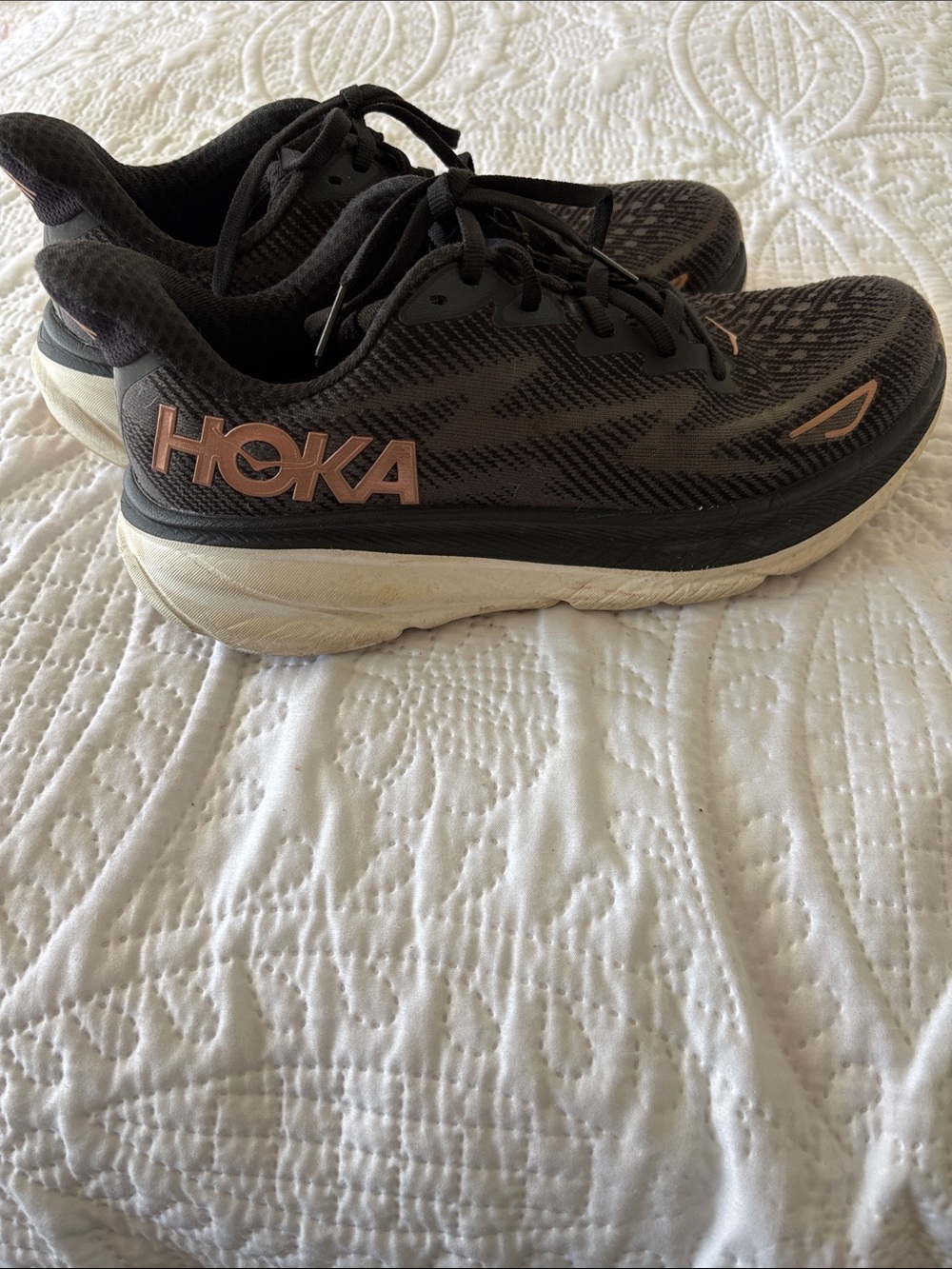 HOKA Clifton 9 Athletic Shoes in Black with Rose Gold Accents
